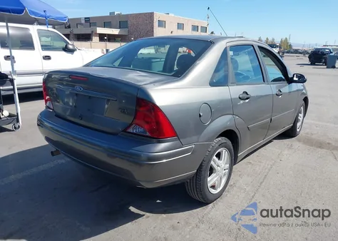 2004 Ford Focus Zts z USA, uszkodzony, nr VIN 1FAFP38Z94W126621